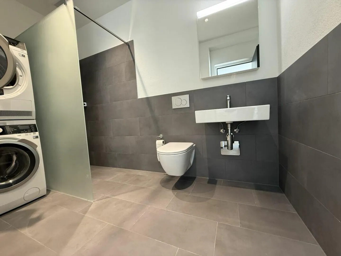 Appartement de 4,5 pièces de style loft, adapté aux familles, avec patio - Photo 9 sur 13