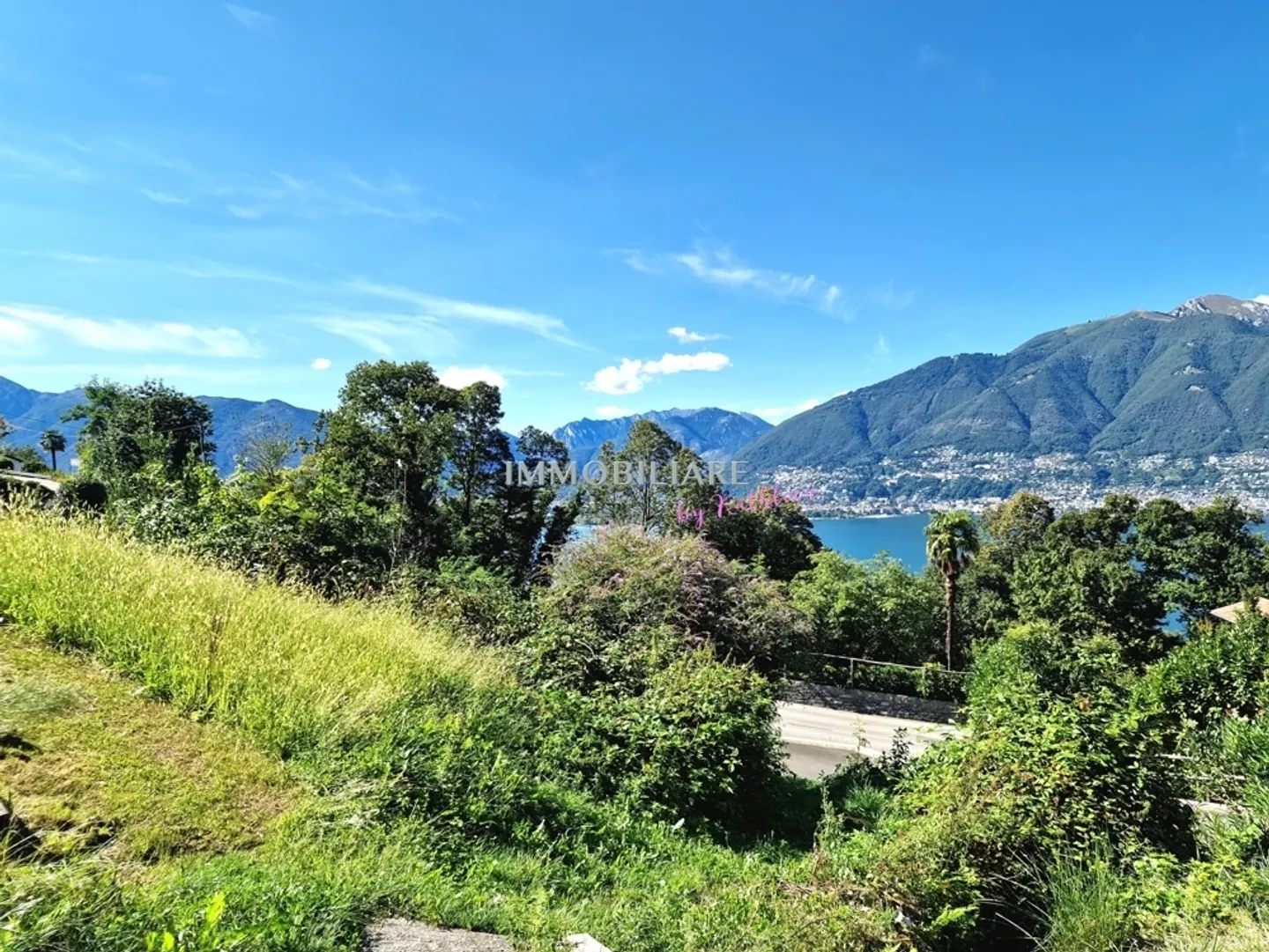 Grundstück mit Seeblick und 4 Parkplätzen - Foto 3 von 6