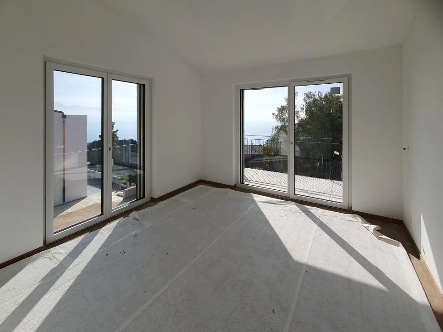 Atemberaubender Blick auf den See - mit Balkon und Garten - Foto 6 von 8