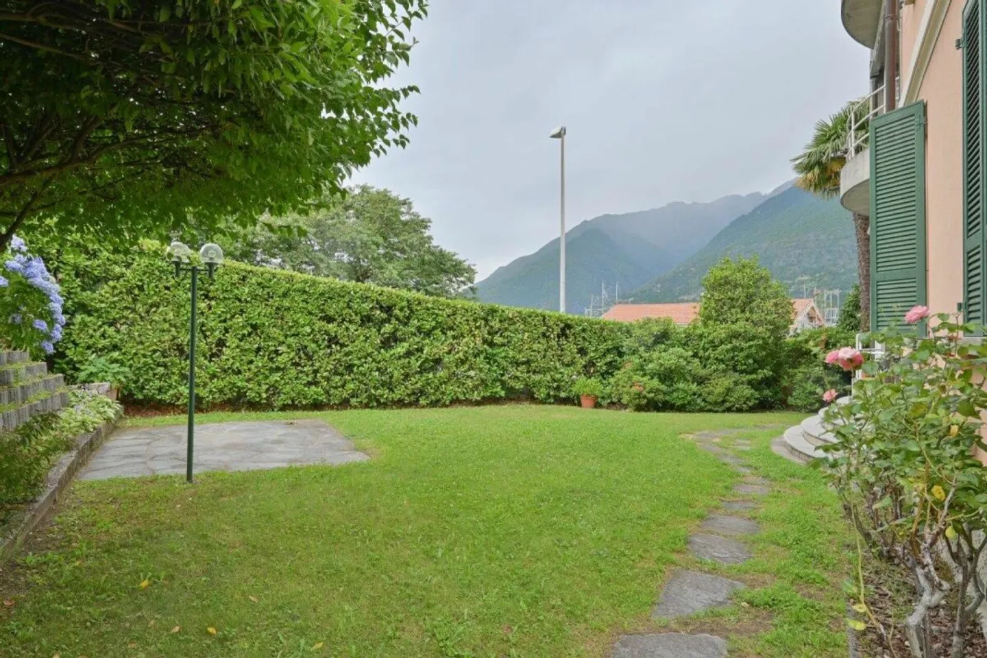 Wohnung mit grossem Garten in Zweifamilienhaus an gesuchter Lage - Foto 4 von 13