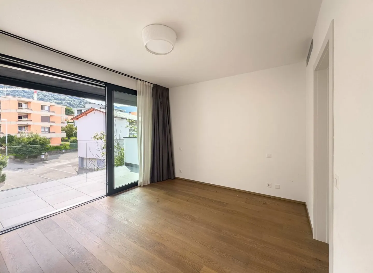 Geräumige Penthousewohnung mit Dachterrasse in Pregassona - Foto 5 von 11