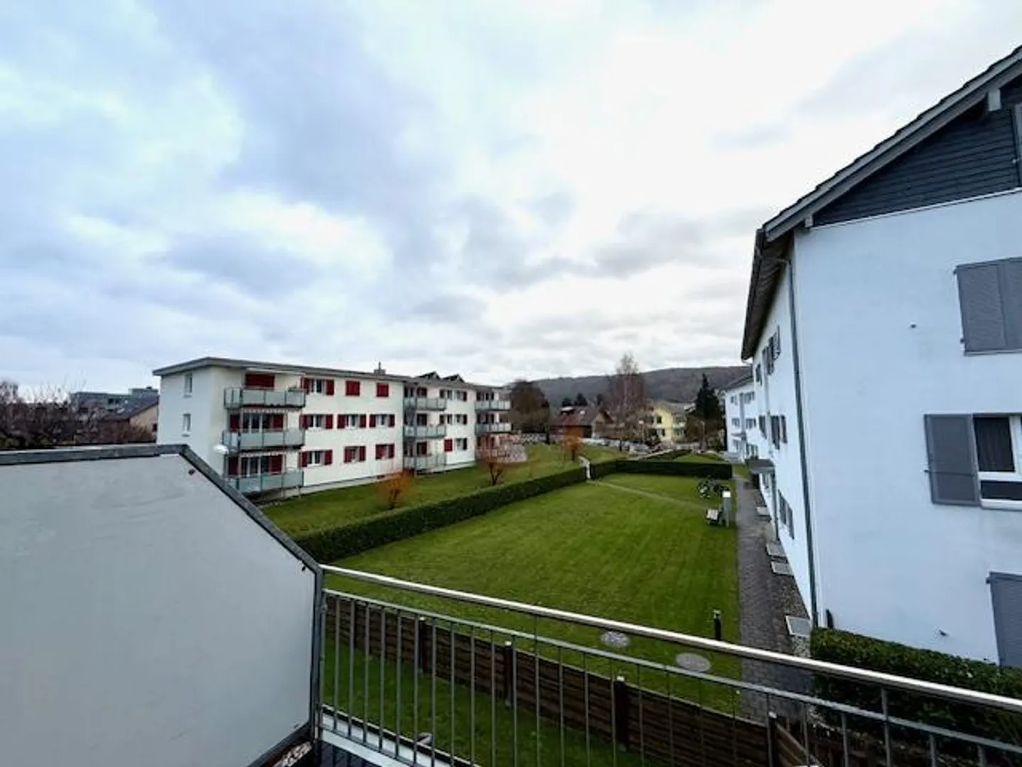 Appartement en duplex de 4,5 pièces - Photo 4 sur 13