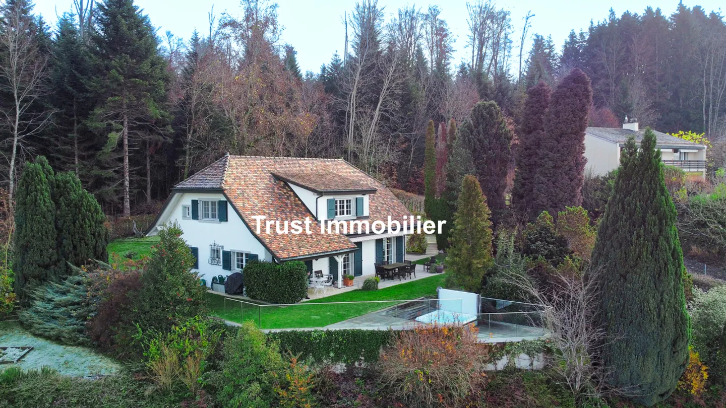 6036.B Einfamilienhaus mit Panoramablick auf den Jura in Cugy - Foto 1 von 24