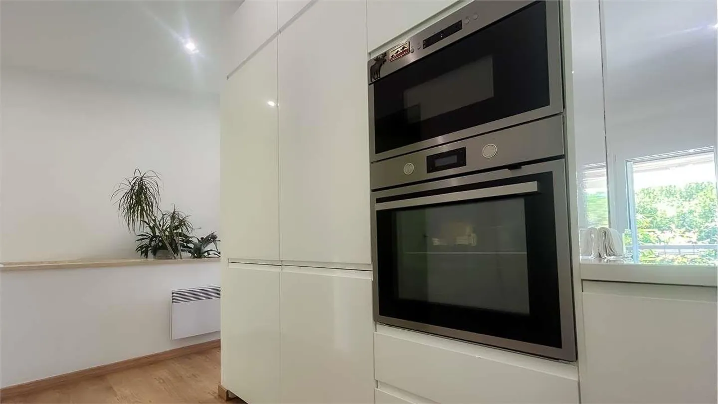 Elegante casa a schiera con giardino - Foto 7 di 13