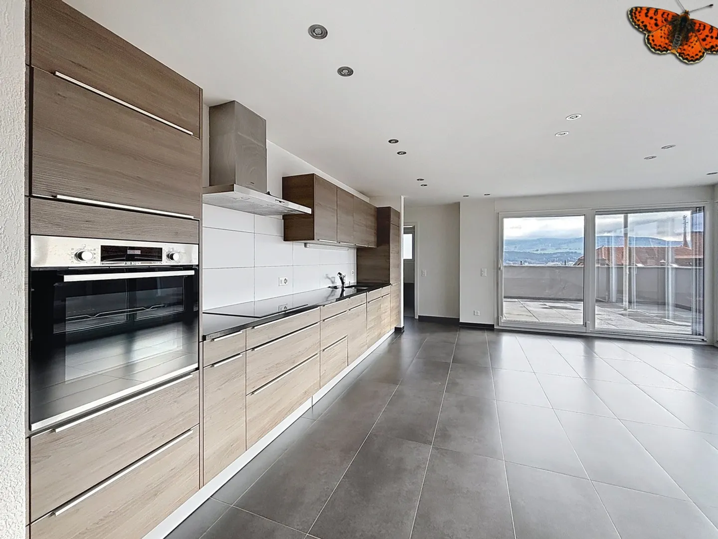 Superbe 3,5-Zimmer-Attikawohnung mit 51,7 m2 Terrasse - Foto 1 von 16