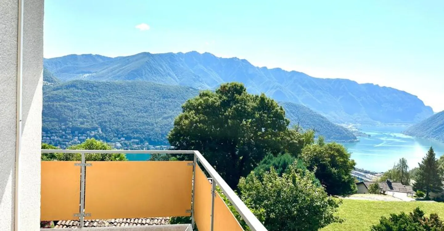 Elegante 3,5-Zimmer-Dachwohnung mit Blick auf den Luganersee - Foto 1 von 10