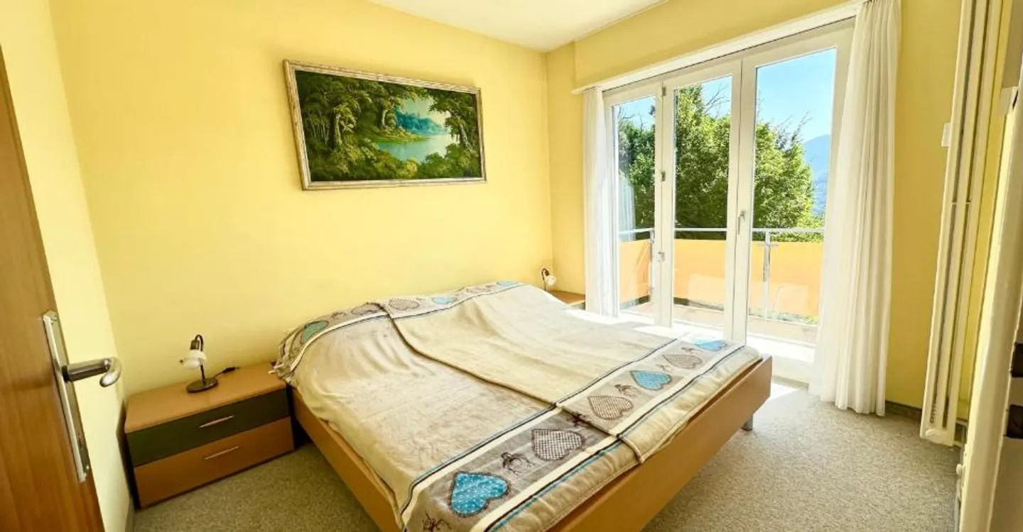 Elegante 3,5-Zimmer-Dachwohnung mit Blick auf den Luganersee - Foto 8 von 10