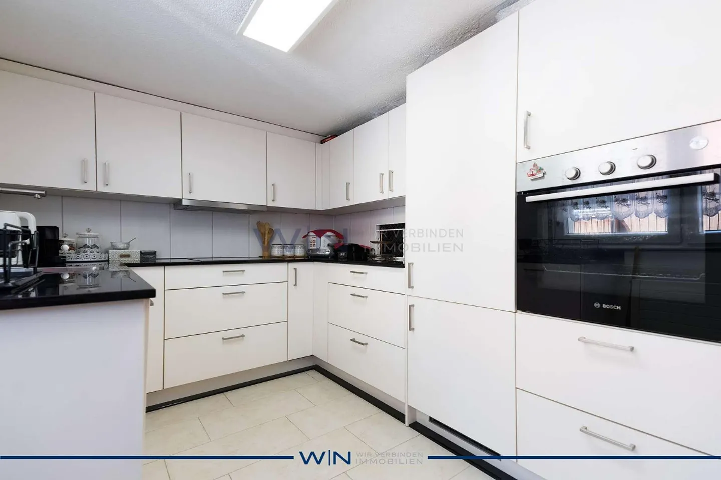 Charmant investissement en maisonette - Photo 4 sur 13