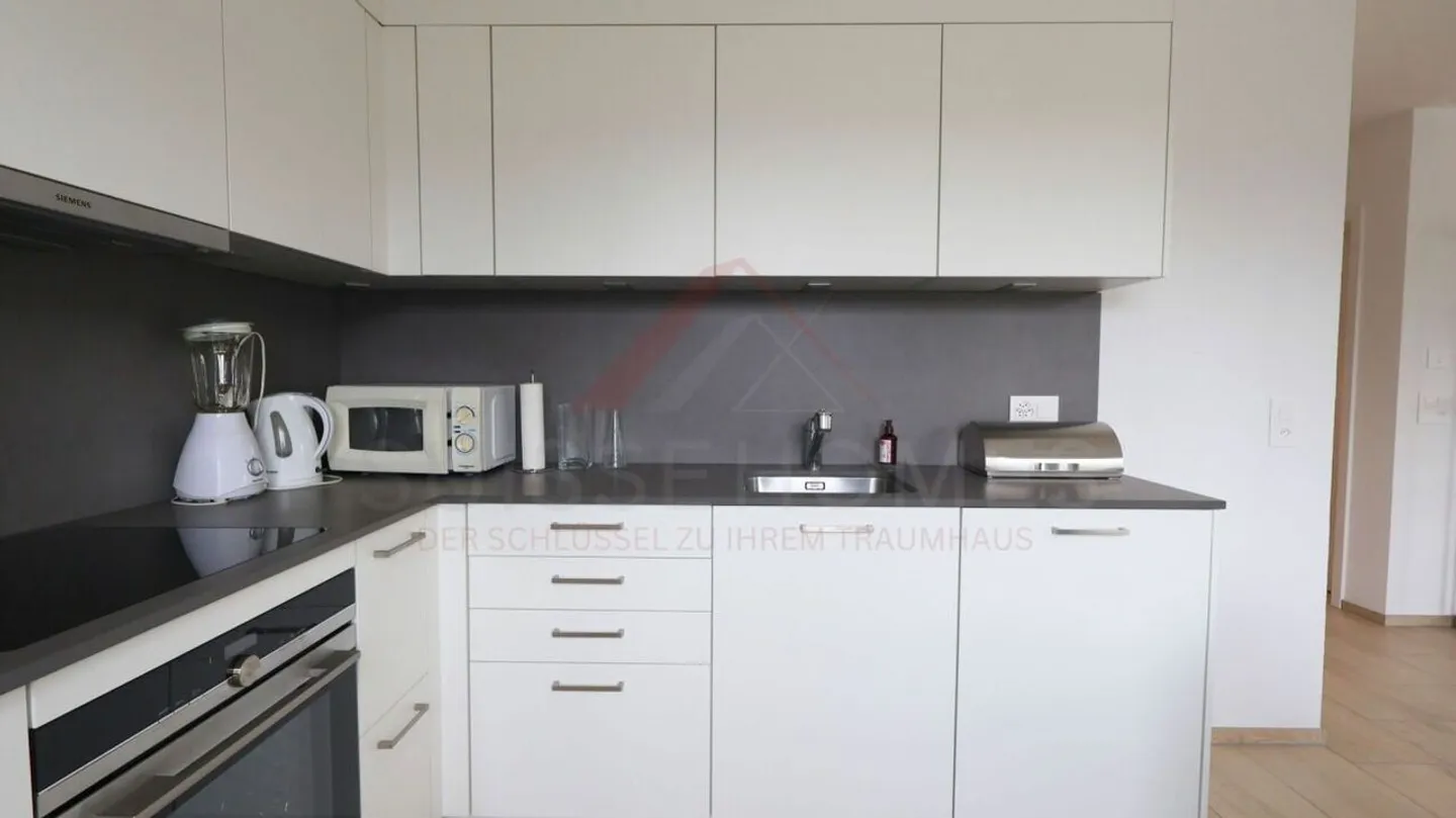 Charmant 2.5 pièces de 60 m² avec terrasse de 17 m² et jardin privatif (24 m²) - lumineux, clé en main et idéal pour vivre ou investir - Photo 5 sur 9