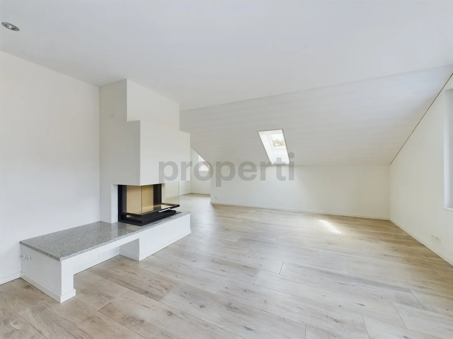 Appartement en attique spacieux de 3,5 pièces avec vue imprenable sur le lac et les montagnes à Hausen am Albis - Photo 1 sur 10