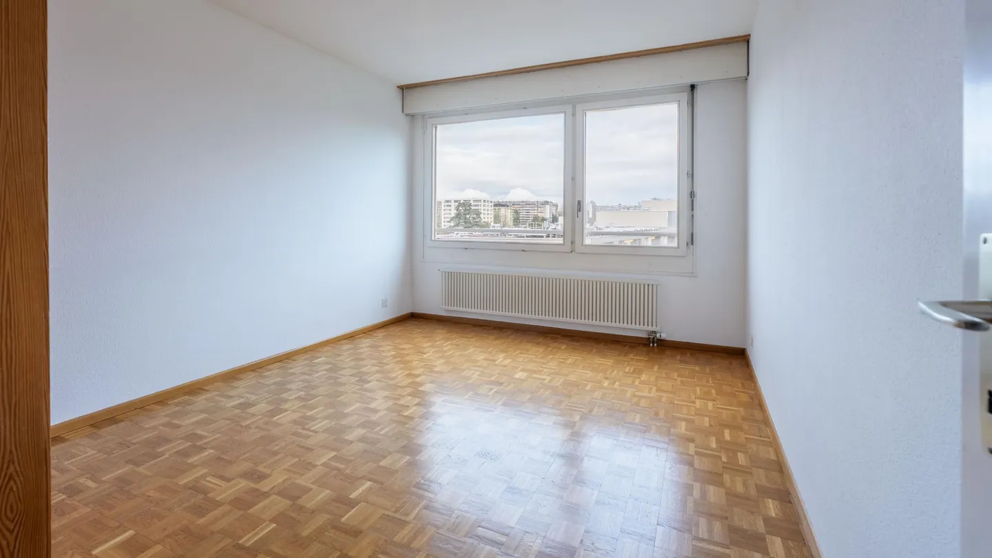 Geräumige Wohnung mit Terrasse - Foto 12 von 18