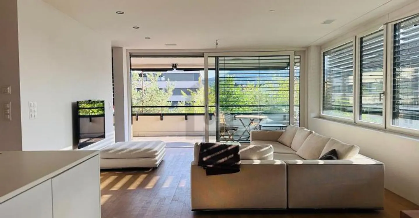 ELEVATED LIVING ENVIRONMENT WITH LARGE LOGGIA - Photo 2 of 5