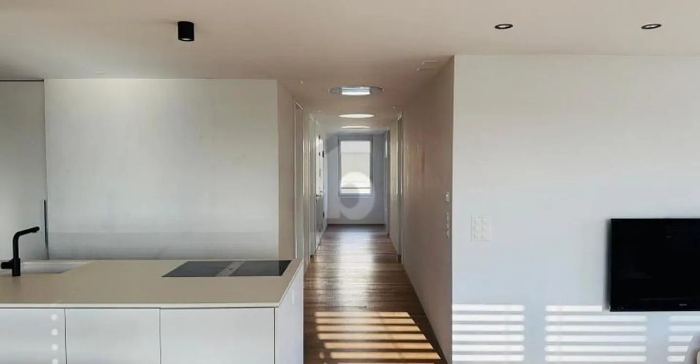 ELEVATED LIVING ENVIRONMENT WITH LARGE LOGGIA - Photo 4 of 5
