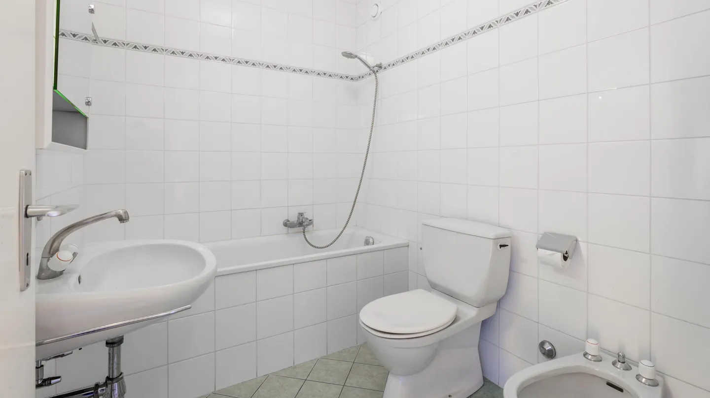 Geräumige Wohnung mit Terrasse - Foto 16 von 18