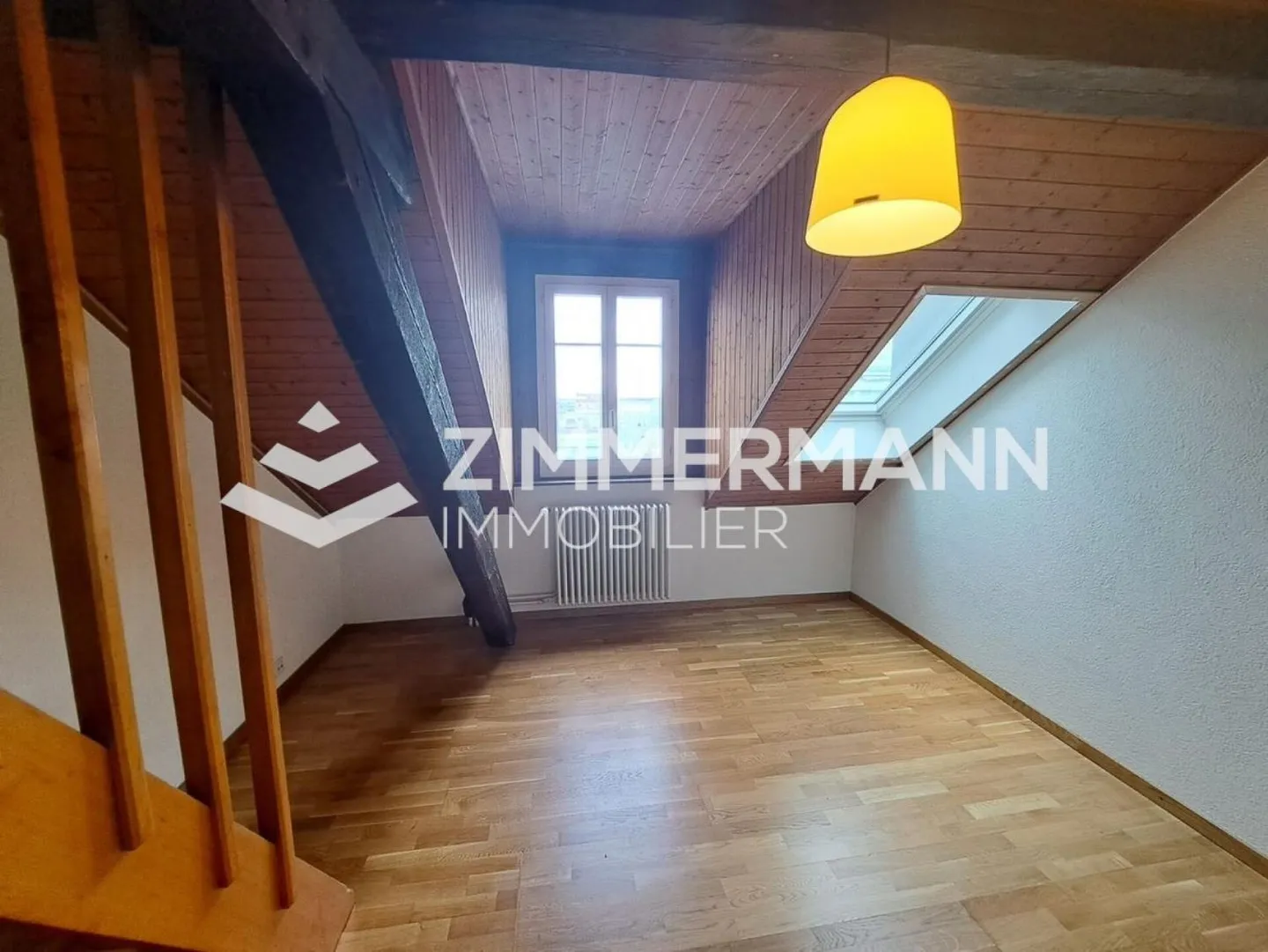 Studio en attique aux Pâquis - Photo 1 sur 4