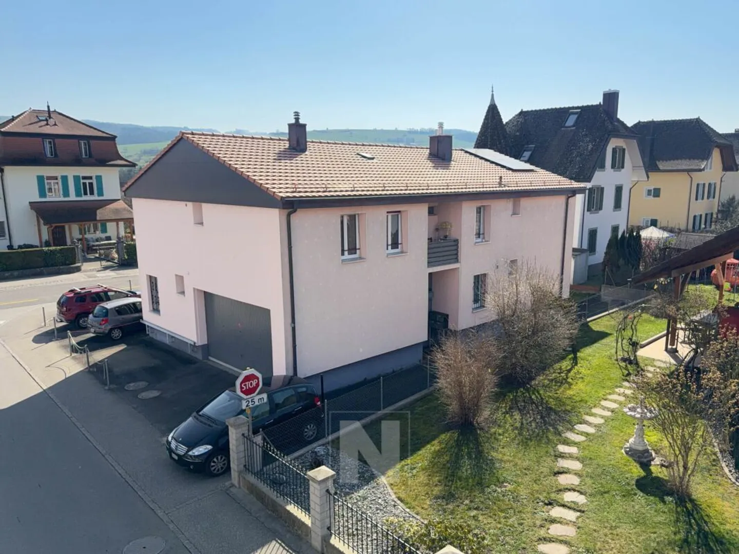 Gebäude mit 4 Wohnungen und Nebengebäuden im Zentrum von Lucens - Foto 13 von 32