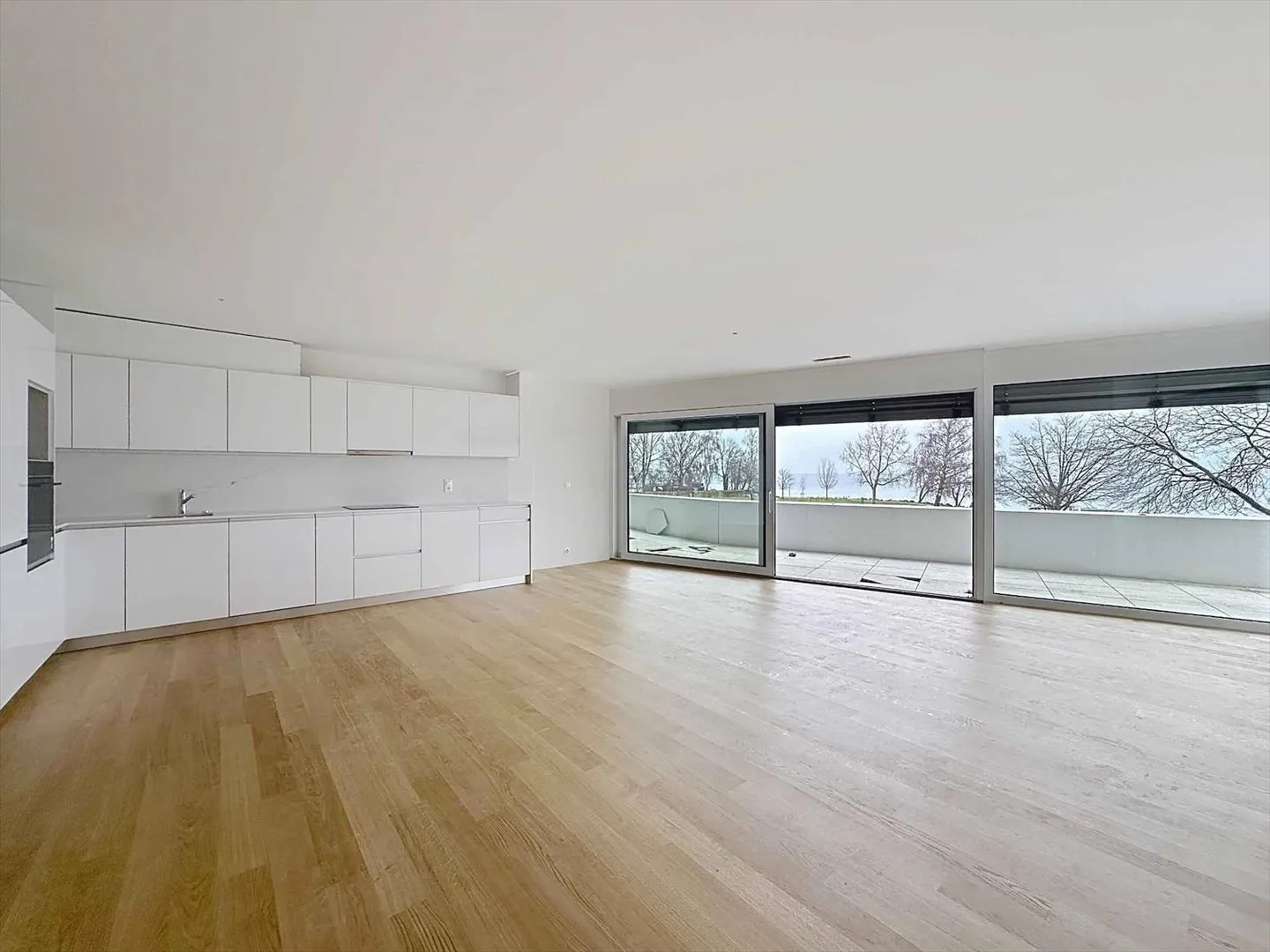 Geräumige Wohnung mit Seeblick - Foto 1 von 12