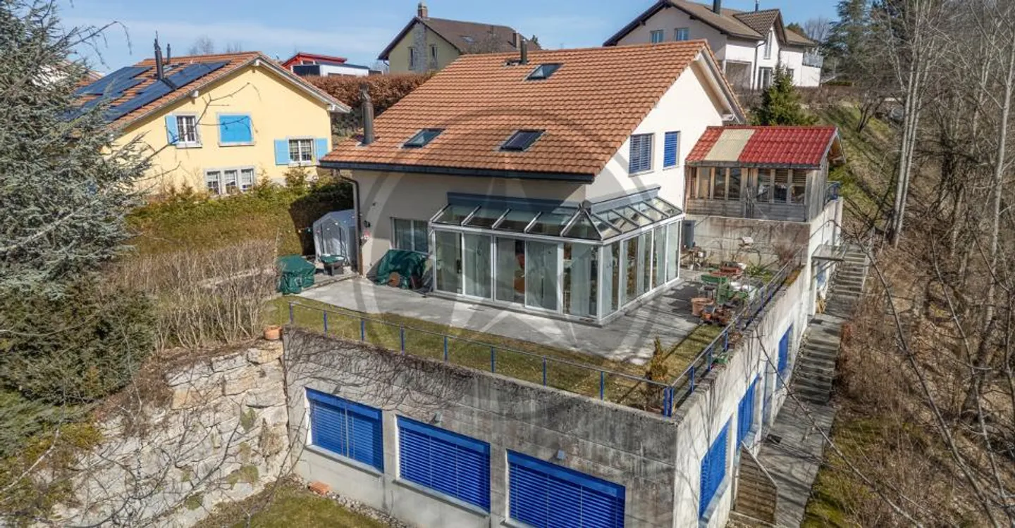 Duplex spacieux avec atelier - Photo 1 sur 10