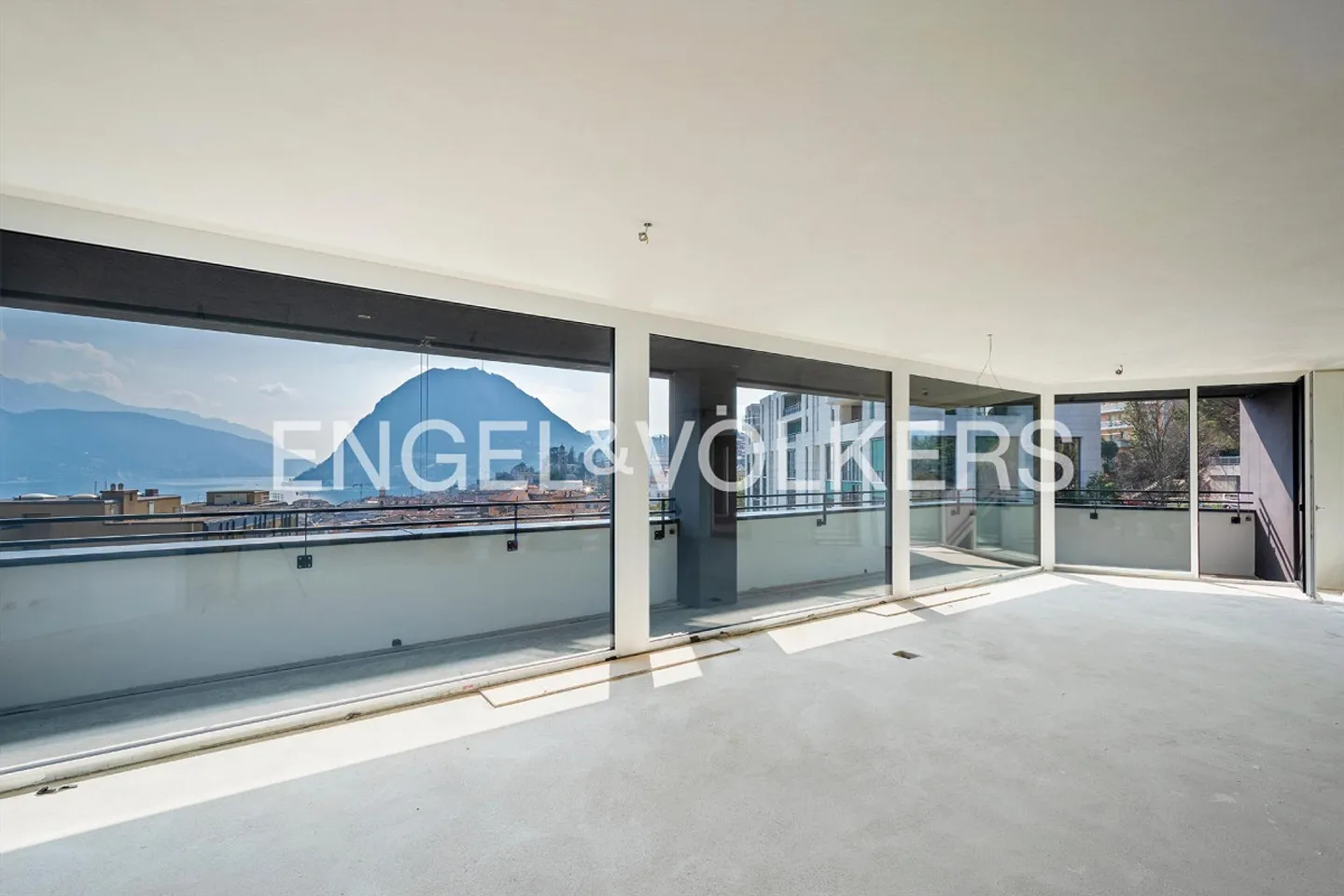 Neue Attique-Wohnungen in Lugano - Foto 1 von 10