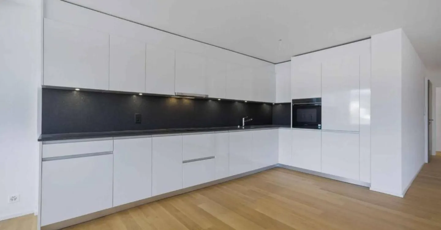 Appartement neuf 4.5 pièces avec balcons - Photo 3 sur 7
