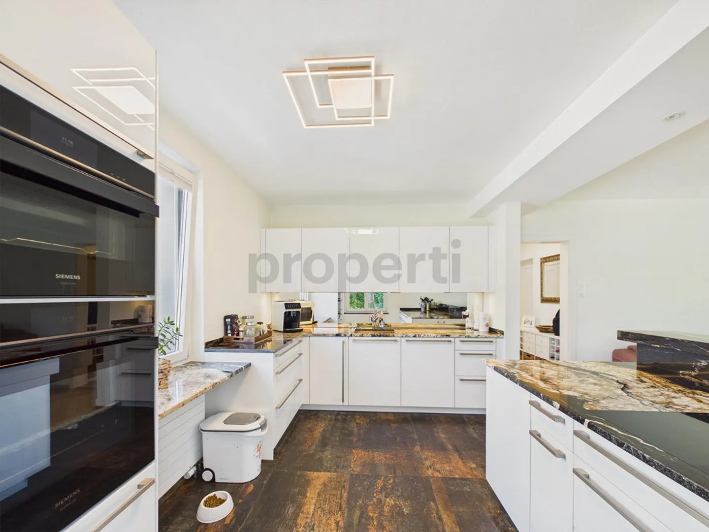Appartamento elegante di 4,5 stanze con interni di alta qualità - Foto 4 di 13