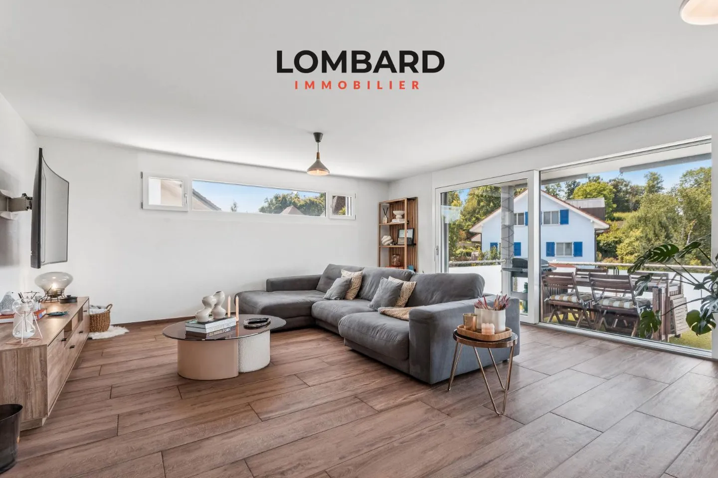Exceptional 4.5-room apartment with private land - Photo 2 of 10