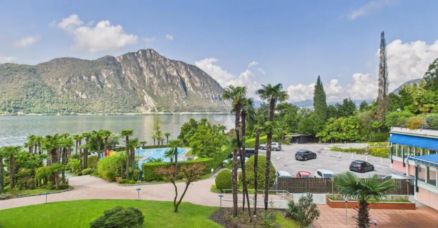 Appartement de 2,5 pièces avec vue sur le lac et piscine en copropriété  idéal comme résidence principale, secondaire ou investissement pour locations de courte durée ! - Photo 9 of 10
