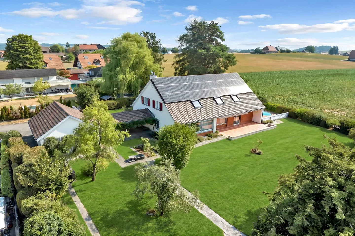 Spacious Living with Unobstructed Views - Family Residence with Pool in Frauenkappelen - Photo 1 of 13