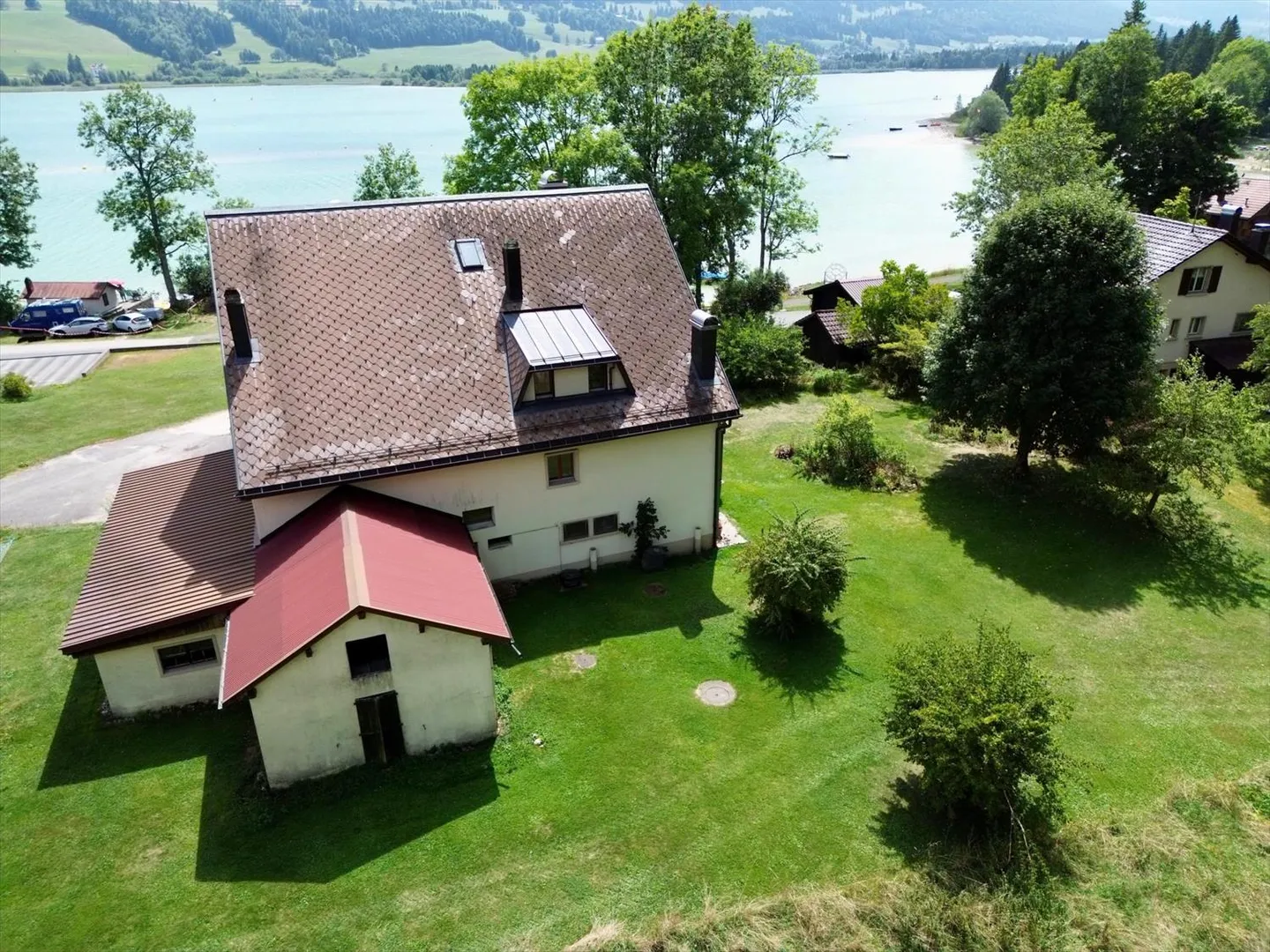 Proprietà redditizia con vista mozzafiato sul lago Joux e potenziale di sviluppo - Foto 6 di 13