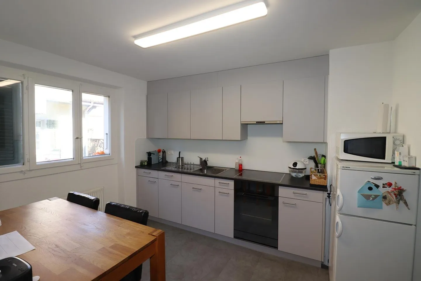 Mehrfamilienhaus mit zwei 3.5 - Zimmerwohnungen und Ausbaupotential - Foto 4 von 11