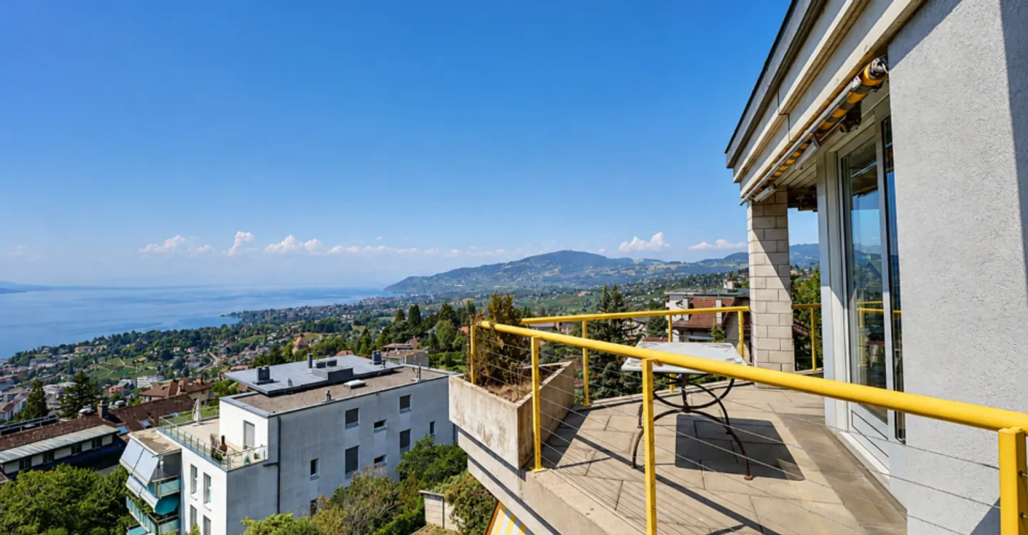 Außergewöhnliches Penthouse mit Panoramablick auf den See und die Berge - Foto 1 von 11