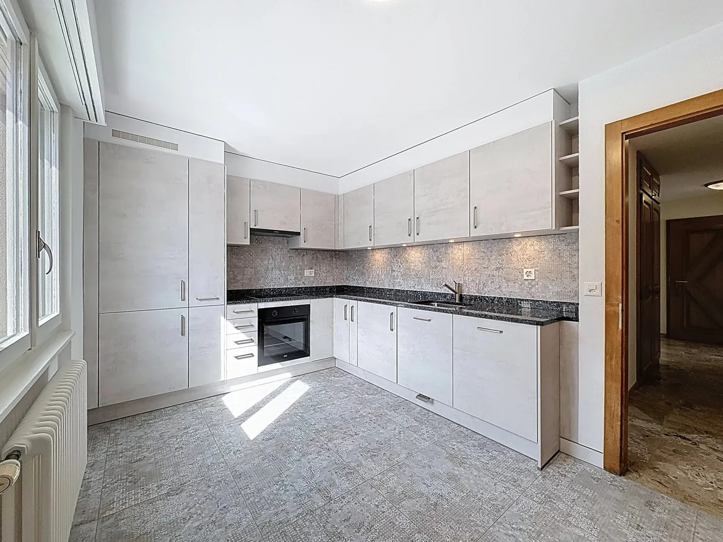 Geräumige 3,5 Zimmer im Herzen des Dorfes - Foto 10 von 15