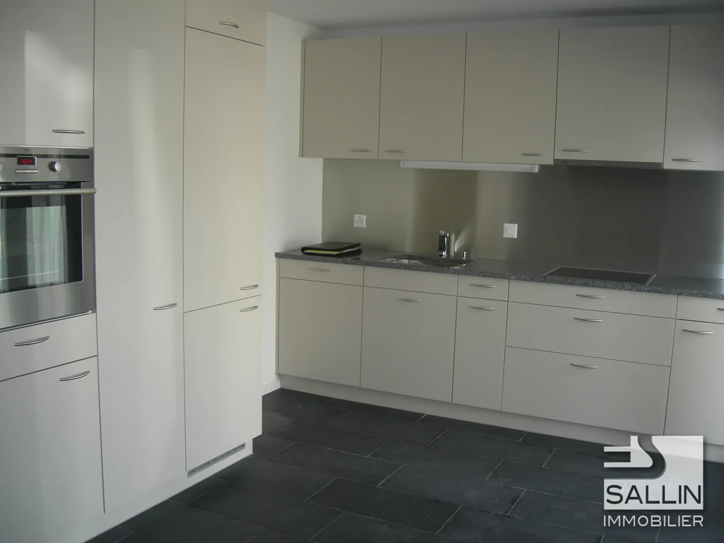 Geräumiges Triplex mit Garten - Foto 1 von 12