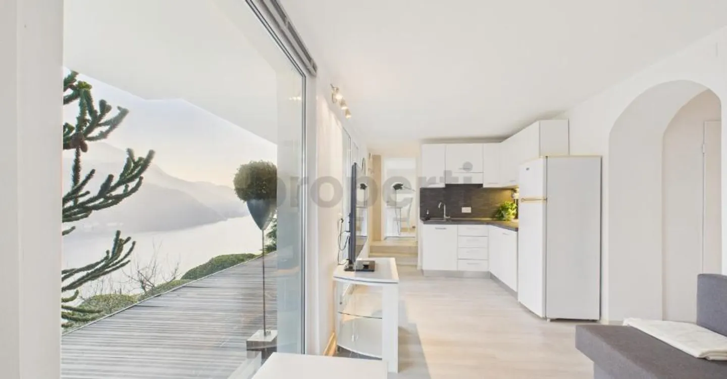 Charming villa in Morcote with garden and stunning lake view - Photo 8 of 11