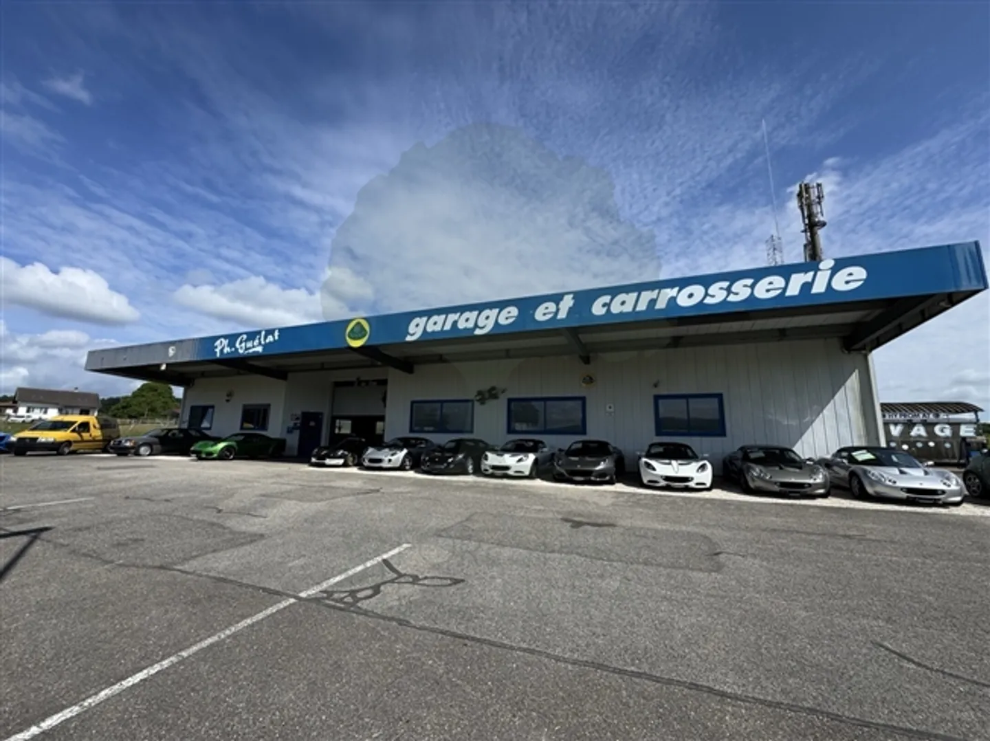 Garage et Carrosserie à Fahy avec Station de Lavage - Photo 1 sur 20