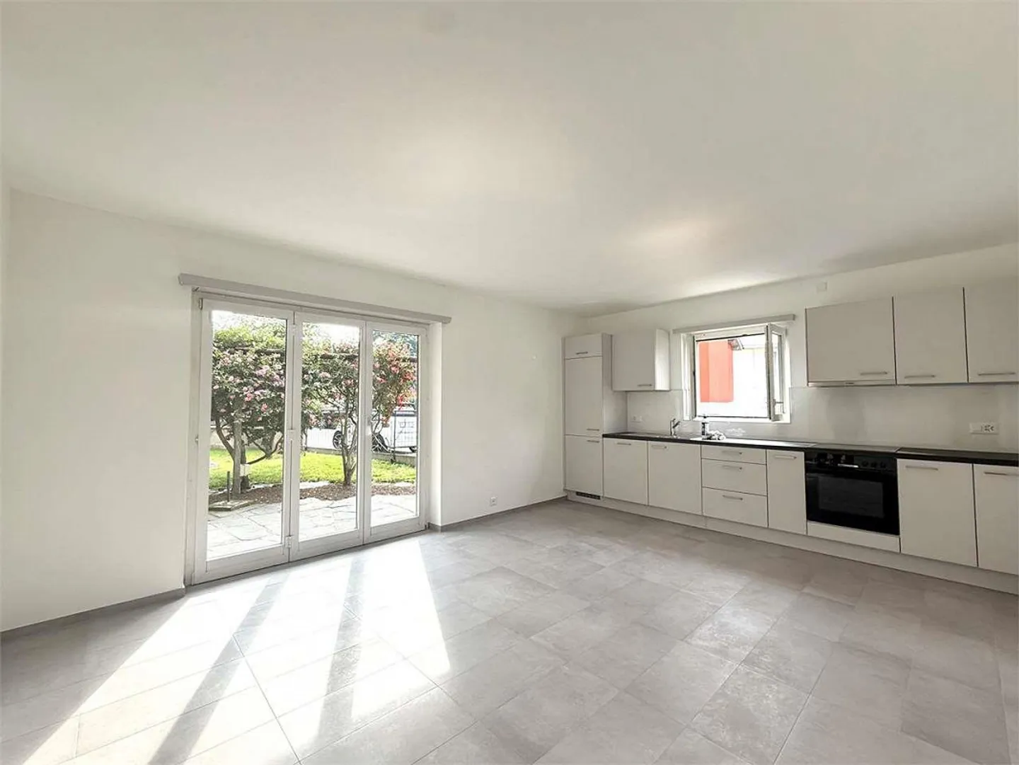 Eine moderne 3,5-Zimmer-Wohnung mit privatem Garten in Pregassona - Foto 1 von 7