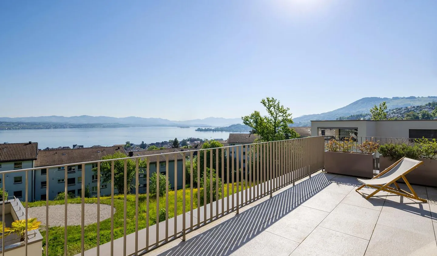 Appartement penthouse neuf avec vue unique sur le lac - Photo 1 sur 8