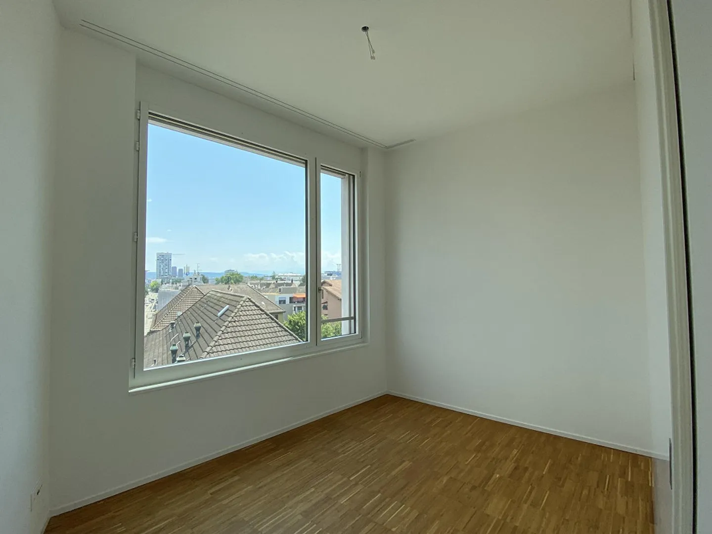 Exklusive Attika-Wohnung mit Weitsicht über Altstetten - Foto 3 von 13