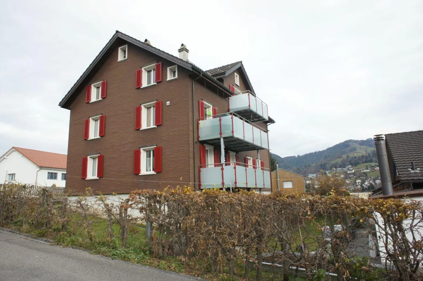 Well-maintained 3-family house with 3 single garages - Photo 1 of 13