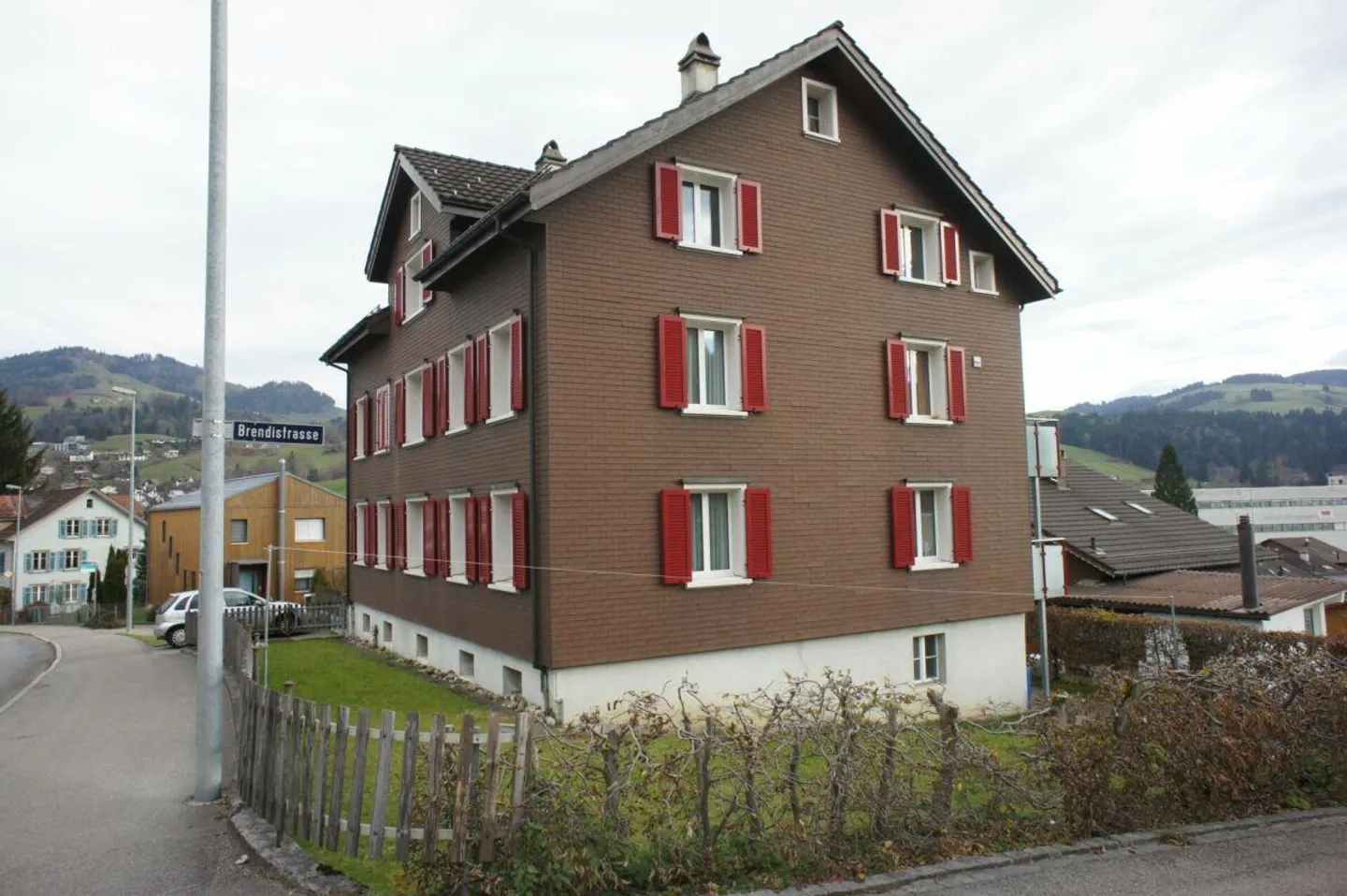 Well-maintained 3-family house with 3 single garages - Photo 3 of 13