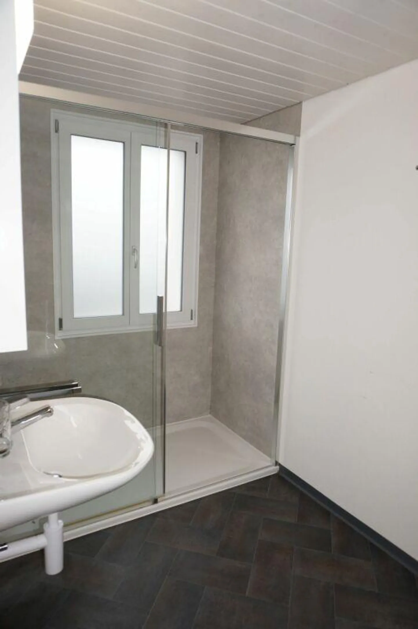 Well-maintained 3-family house with 3 single garages - Photo 6 of 13