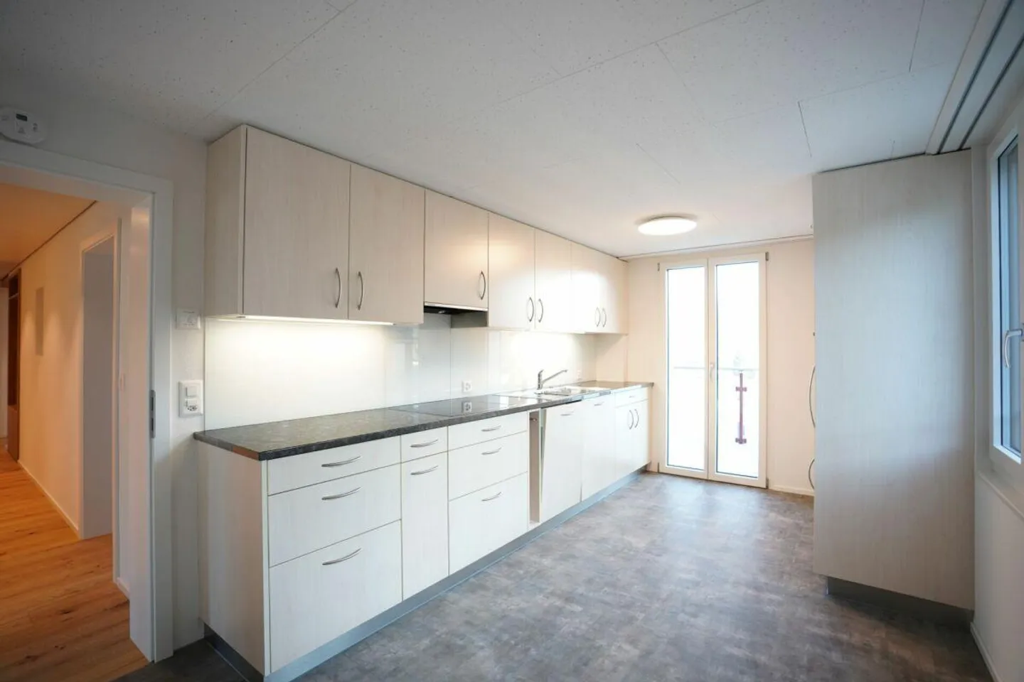 Well-maintained 3-family house with 3 single garages - Photo 7 of 13