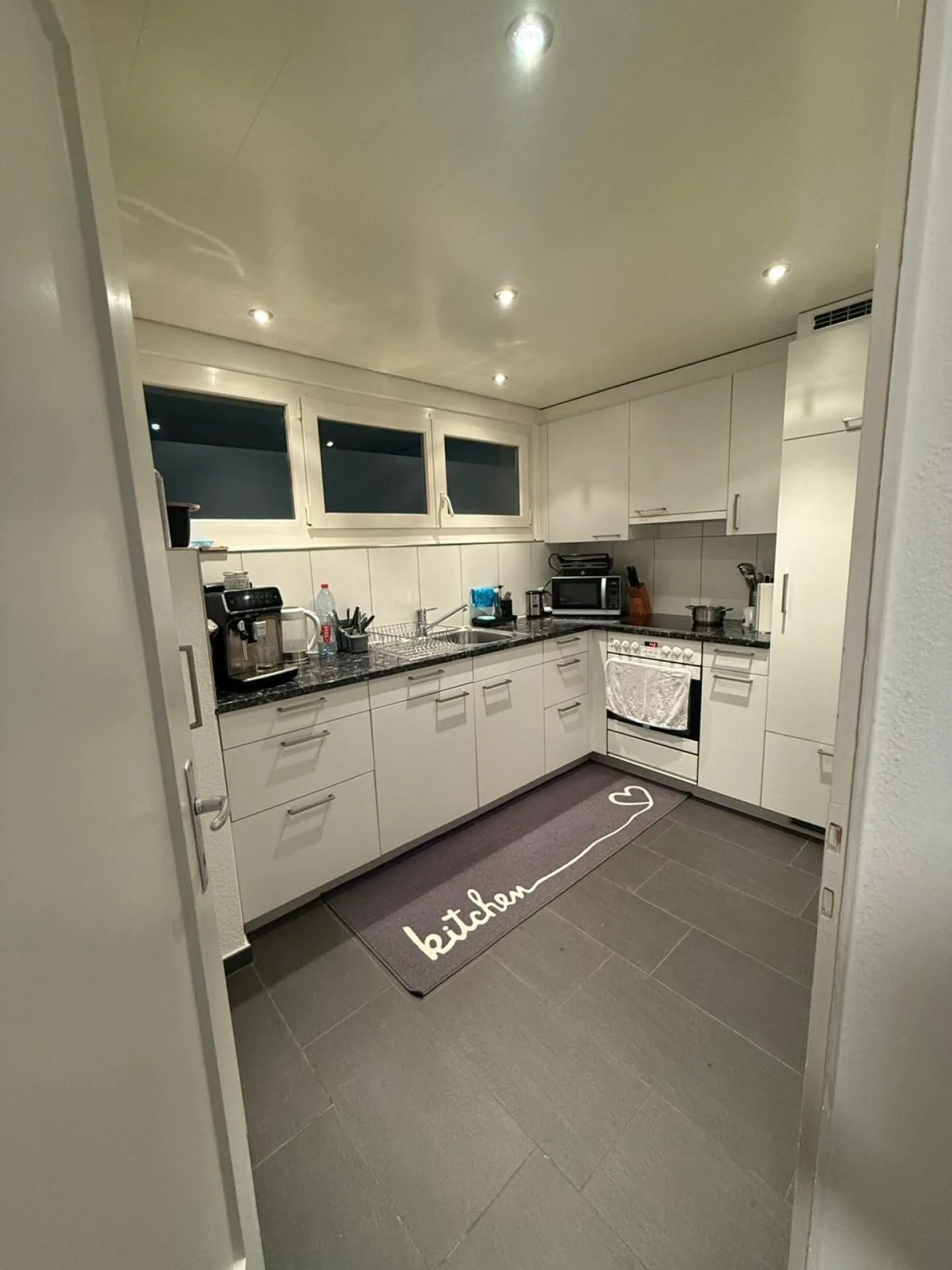 12-family house with 9 garages and 4 parking spaces. - Photo 2 of 6