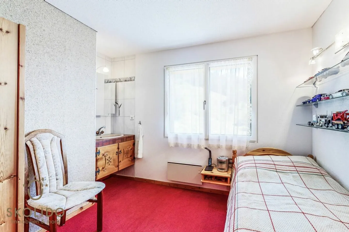 Modernisiertes Chalet mit Einliegerwohnung und Weitblick - Foto 19 von 36