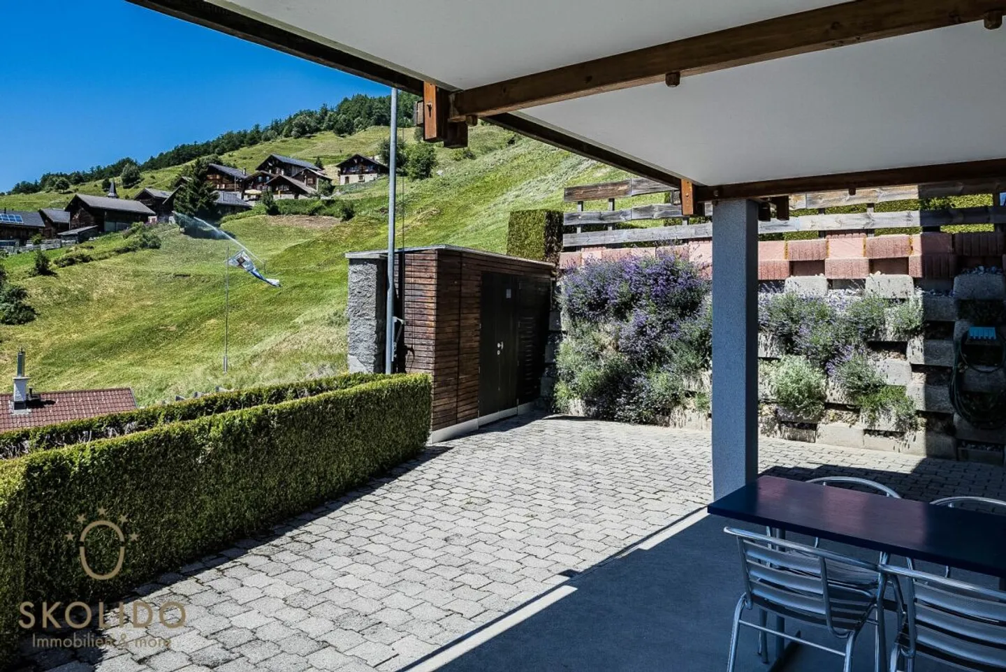 Modernisiertes Chalet mit Einliegerwohnung und Weitblick - Foto 30 von 36
