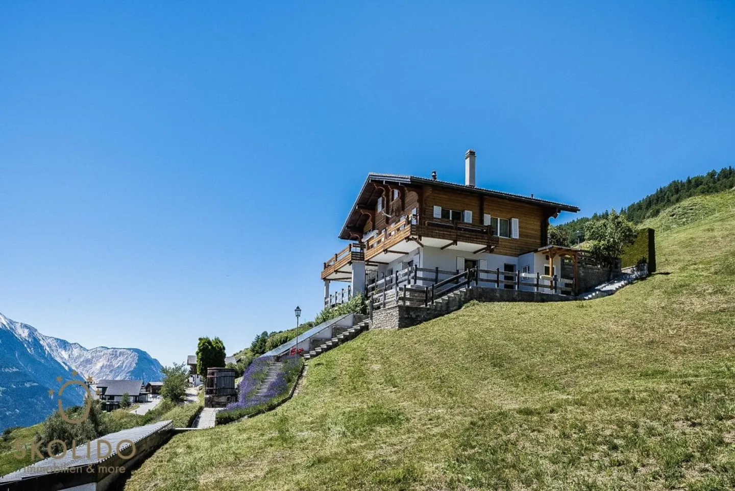 Modernisiertes Chalet mit Einliegerwohnung und Weitblick - Foto 32 von 36