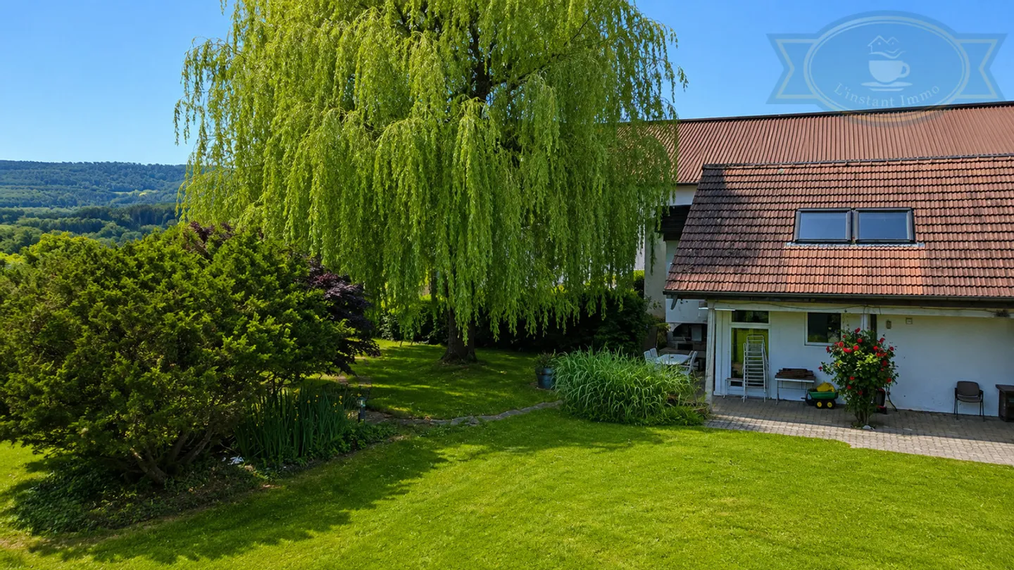 Haus mit zwei Wohnungen, großem Grundstück und ausbaubarem Pavillon - Foto 15 von 17