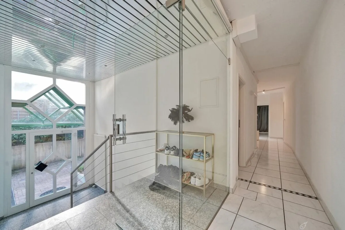 Renovated multi-family house with 5 residential units and parking garage - Photo 1 of 13