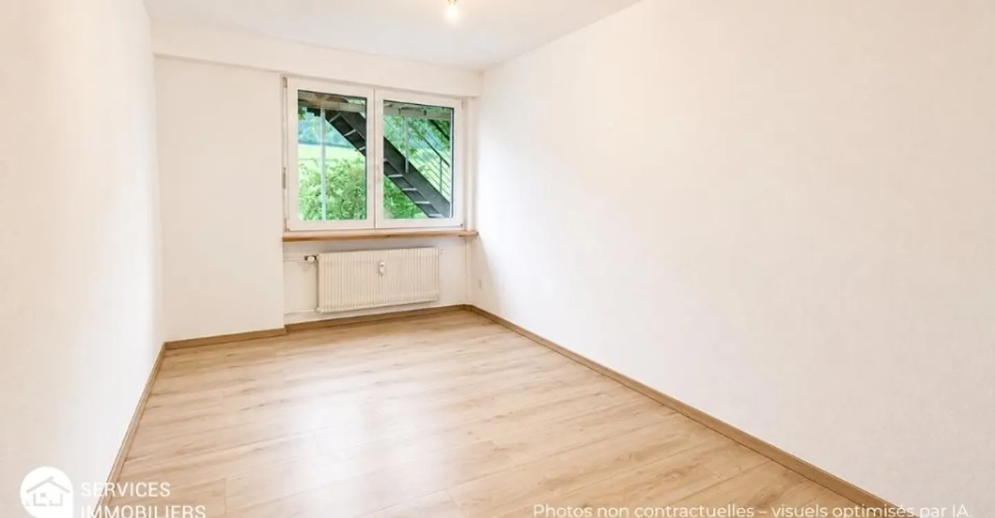 Charming garden-level apartment in the heart of Chasseral Park - Photo 10 of 12