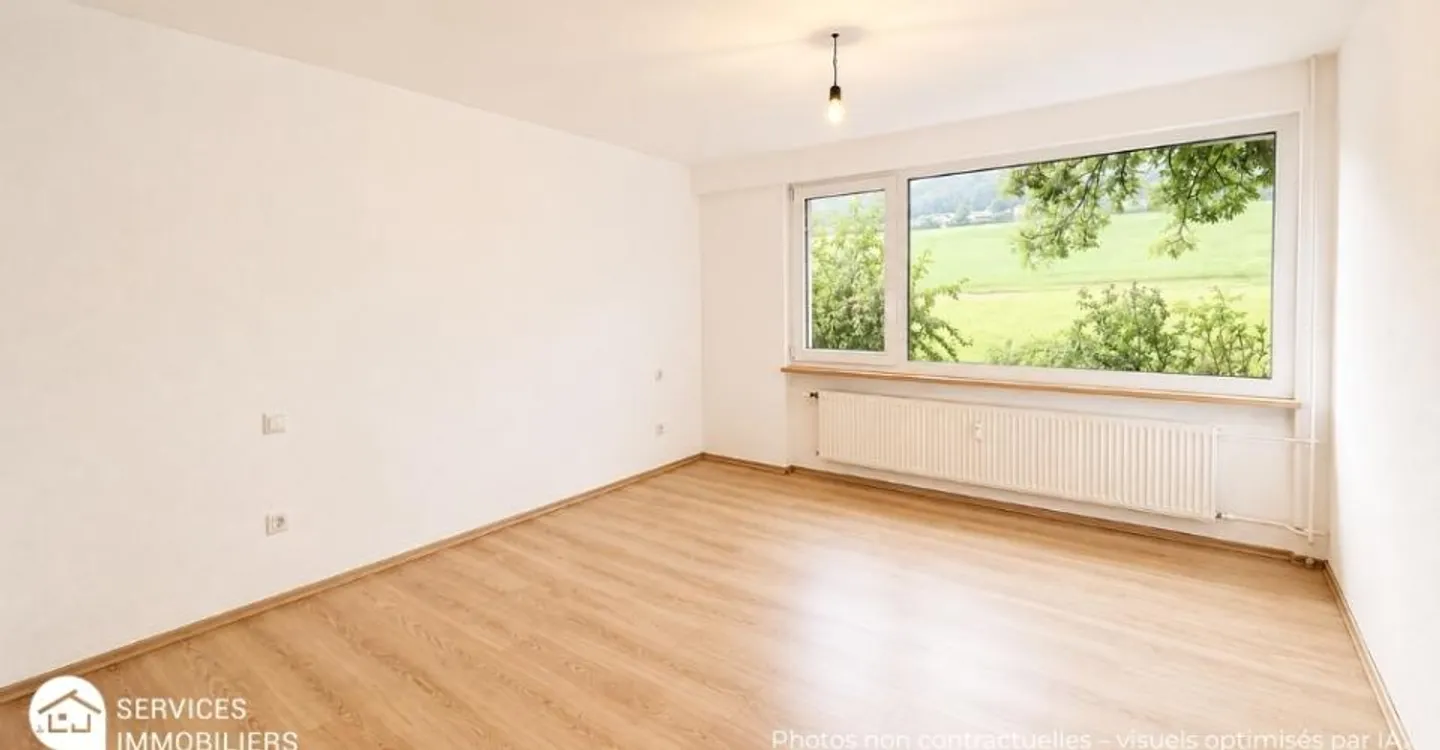Charming garden-level apartment in the heart of Chasseral Park - Photo 11 of 12